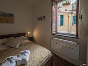 A bed or beds in a room at El Nin Apartment with Terrace