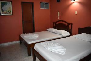 Кровать или кровати в номере LA POSADA DEL VIAJERO