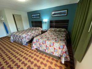 Lodge Inn Wrightstown - Fort Dix客房内的一张或多张床位