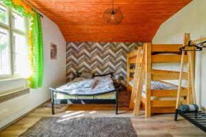 Posteľ alebo postele v izbe v ubytovaní Borovnička + 27 fotografií