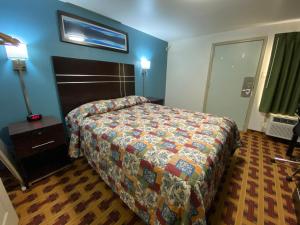 Lodge Inn Wrightstown - Fort Dix客房内的一张或多张床位