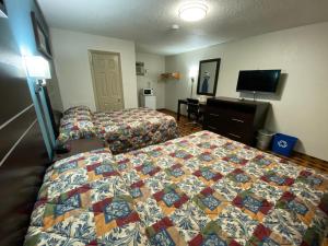 Lodge Inn Wrightstown - Fort Dix客房内的一张或多张床位