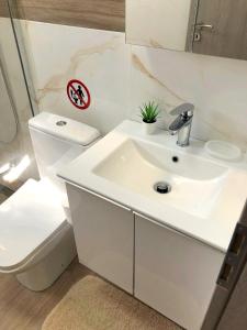 A bathroom at Apartments M, Kallikratia