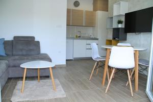 A kitchen or kitchenette at Apartments M, Kallikratia