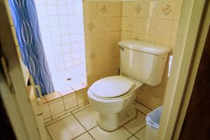 Ванная комната в Tropical Breeze Vacation Home and Apartments