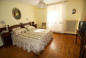 Säng eller sängar i ett rum på Albergo Ristorante Galli