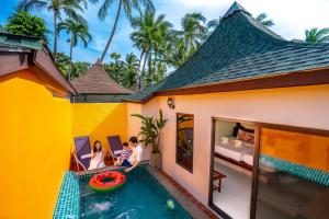 a villa with a pool and a house at Chaweng Buri Resort in Chaweng +72 photos