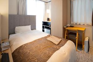 Кровать или кровати в номере Place Hotel Ascot