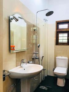 Kylpyhuone majoituspaikassa Pearl House Resort