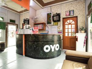 a store with an omo counter in a room at D' Anjung Inn in Tangkak