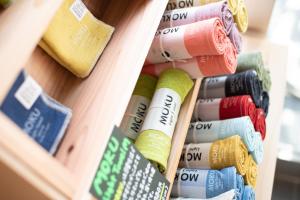 a bunch of different colored rolls of thread at Uwajima Oriental Hotel in Uwajima
