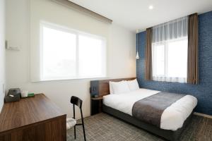 Postel nebo postele na pokoji v ubytování M's Hotel Kyoto Station Kizuya + 21 fotografií