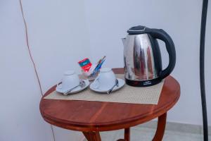 Příslušenství pro přípravu čaje a kávy v ubytování DANDELION - Unawatuna