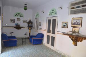 Ruang duduk di Kishan Palace-A heritage Hotel