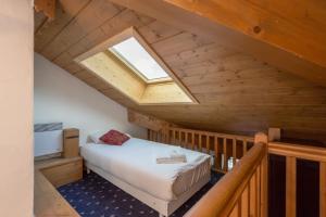 Posteľ alebo postele v izbe v ubytovaní Polaris - Chamonix