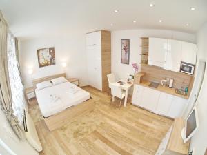 Posteľ alebo postele v izbe v ubytovaní Apartments Sweet Escape