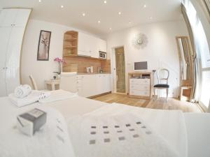 Posteľ alebo postele v izbe v ubytovaní Apartments Sweet Escape