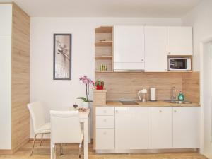 Kuchyňa alebo kuchynka v ubytovaní Apartments Sweet Escape