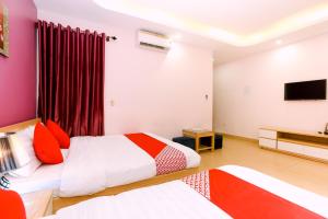Postel nebo postele na pokoji v ubytování Tuan Anh Hotel