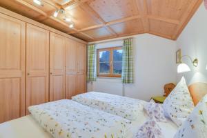 Postel nebo postele na pokoji v ubytování Ferienwohnung Sommerwind