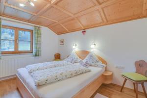Ein Bett oder Betten in einem Zimmer der Unterkunft Ferienwohnung Sommerwind