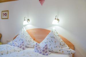 Postel nebo postele na pokoji v ubytování Ferienwohnung Sommerwind