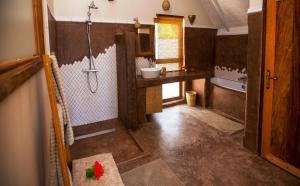 Vannituba majutusasutuses Clove Island Villas & Spa