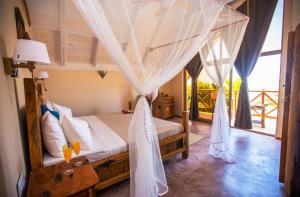 Voodi või voodid majutusasutuse Clove Island Villas & Spa toas