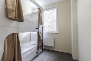 Postel nebo postele na pokoji v ubytování hi Hostel