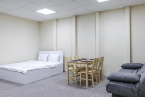 Postel nebo postele na pokoji v ubytování hi Hostel