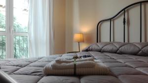 Posteľ alebo postele v izbe v ubytovaní "RUNFULÌA" Deluxe apartment