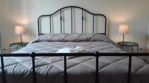 Posteľ alebo postele v izbe v ubytovaní "RUNFULÌA" Deluxe apartment