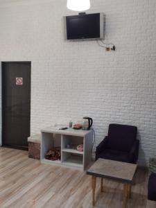 TV a/nebo společenská místnost v ubytování Mini Hotel na Gasheka