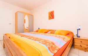 Łóżko lub łóżka w pokoju w obiekcie Apartmani Andreas