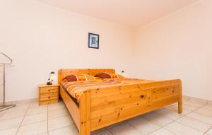 Łóżko lub łóżka w pokoju w obiekcie Apartmani Andreas