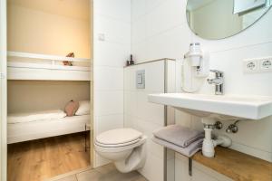 Koupelna v ubytování De Herberg Appartementen