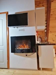 Cucina o angolo cottura di Apartmani RUNOLIST