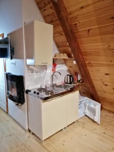 Cucina o angolo cottura di Apartmani RUNOLIST