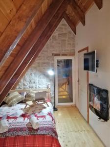 Letto o letti in una camera di Apartmani RUNOLIST