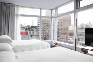 Postel nebo postele na pokoji v ubytování The Standard - East Village