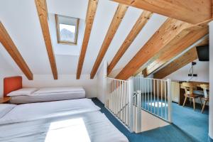 A bed or beds in a room at MyTime Hotels Savoy