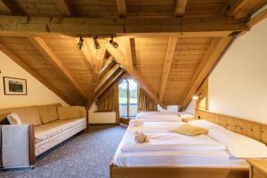 A bed or beds in a room at MyTime Hotels Savoy