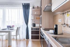 A kitchen or kitchenette at Matthias Home Midtown Budapest