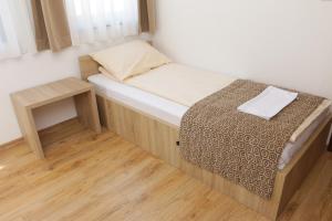Letto o letti in una camera di Hotel Logavina 8 Garage Parking