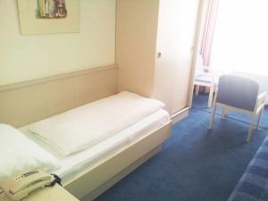 Postel nebo postele na pokoji v ubytování Hotel Goethehof