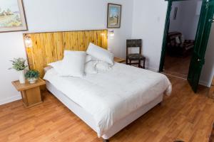 Ένα ή περισσότερα κρεβάτια σε δωμάτιο στο 3 Darling Street Guest House