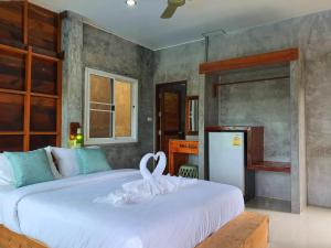 Postel nebo postele na pokoji v ubytování Life koh tao resort