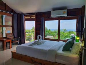 Postel nebo postele na pokoji v ubytování Life koh tao resort