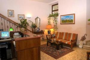 TV a/nebo společenská místnost v ubytování Hotel Umbria