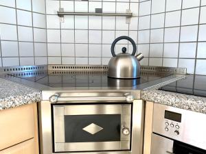 A kitchen or kitchenette at Apartment HaNiLe